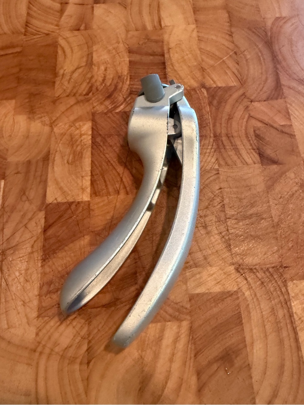 Pampered Chef garlic press with cleaning attachment